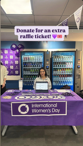 Women in Business booth at the fair with a raffle sign