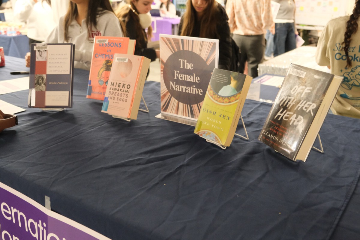 Vendor table with books by women authors at the fair